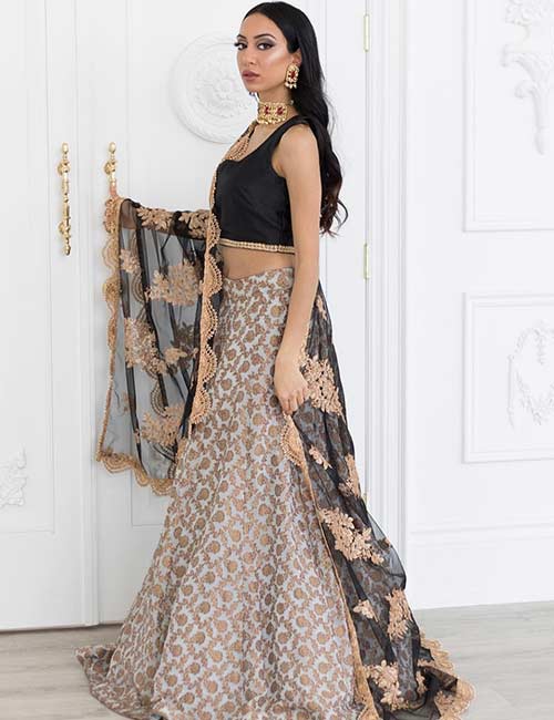 3. Gold And Black Lehenga For The Bride