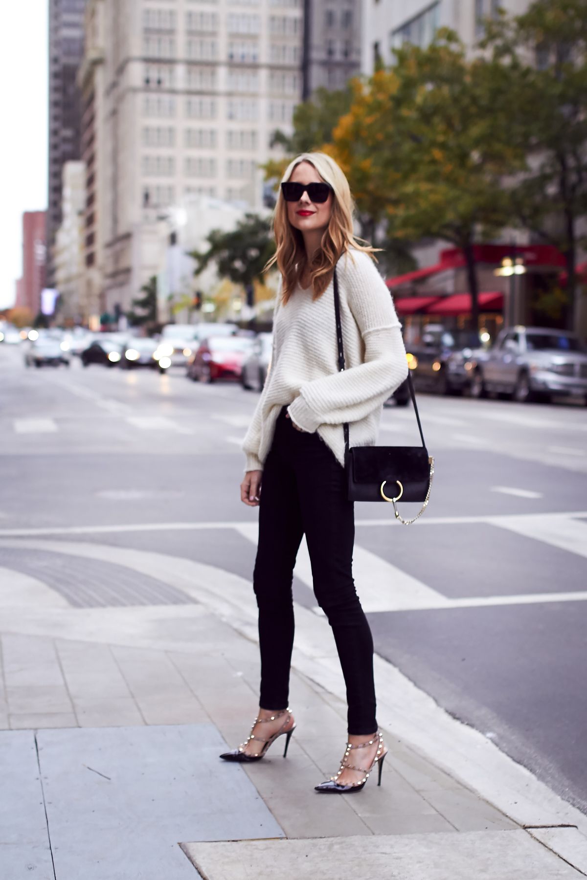 black and white sweater with skinny min